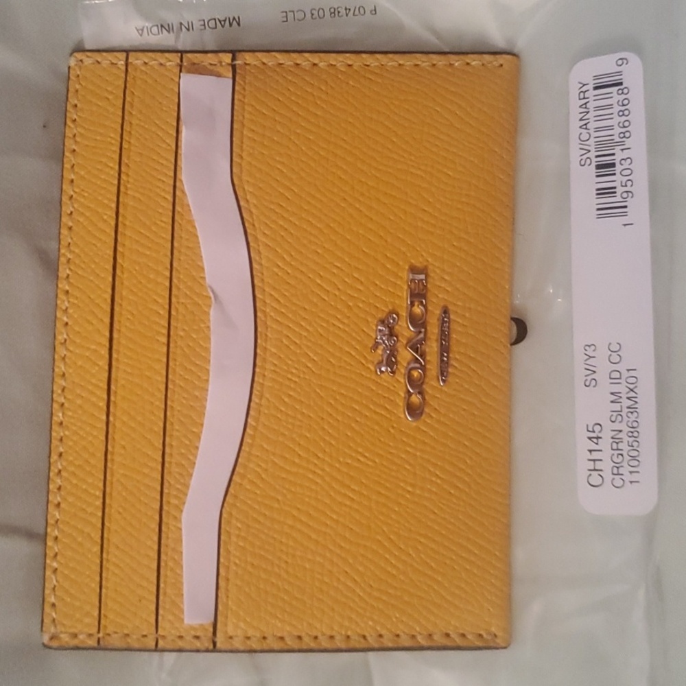 BNWT Authentic Coach Id holder $65-. OBO. Yellow 2 Left  Orange 1 Left - Picture 8 of 8